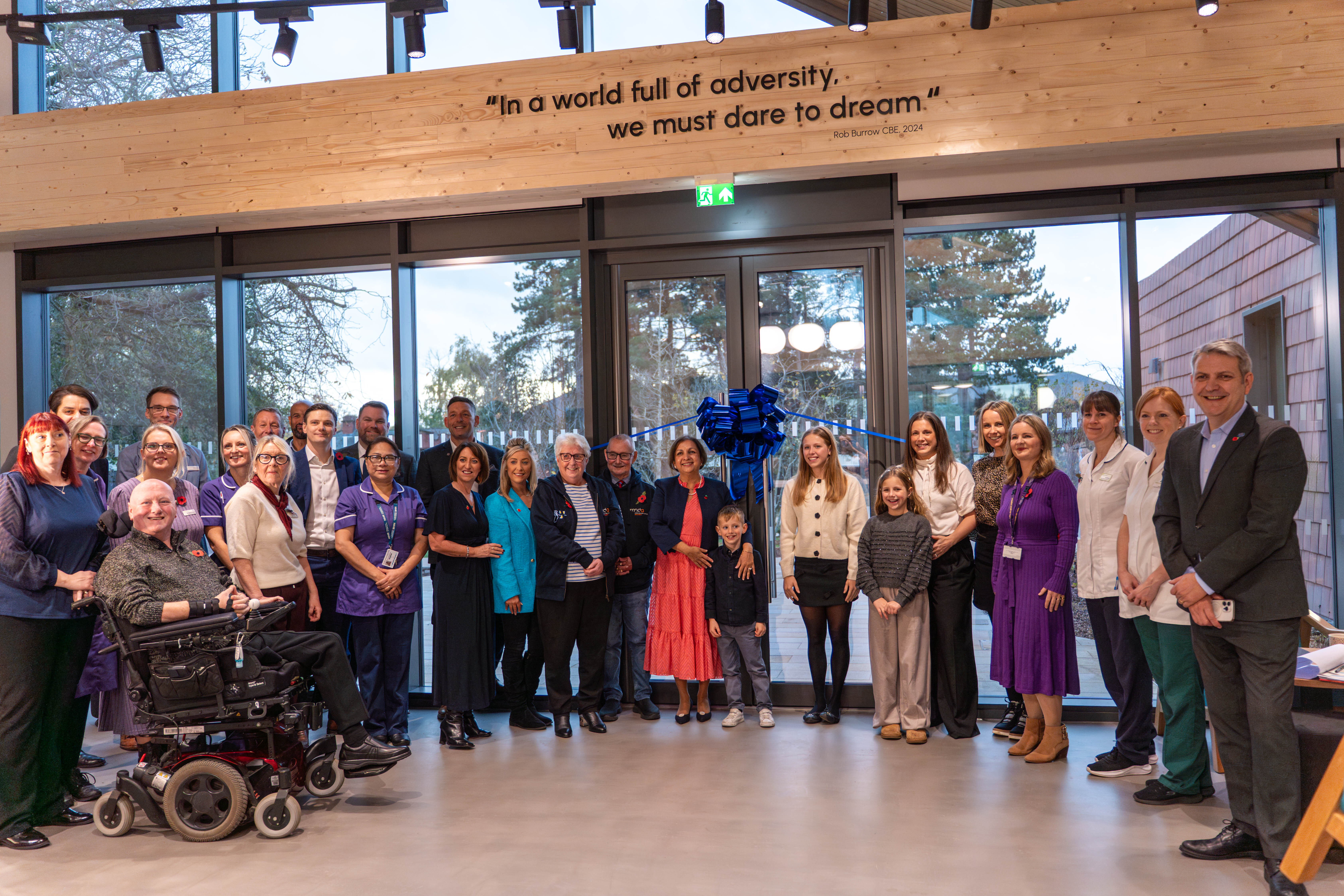 Clinical staff patients and the Burrow family inside the new Rob Burrow Centre for MND