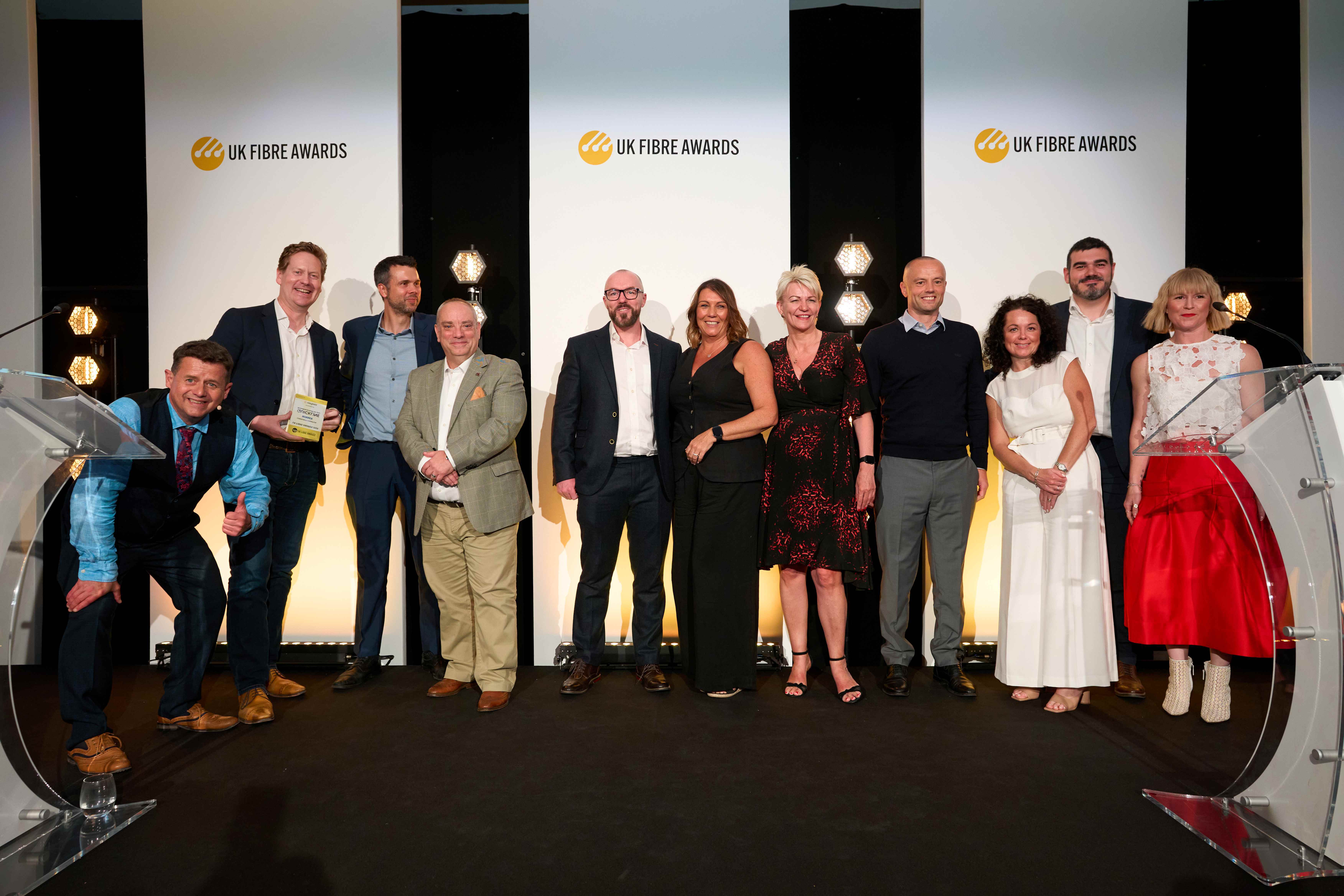 Quickline team members celebrating the companys double win at the UK Fibre Awards 2026