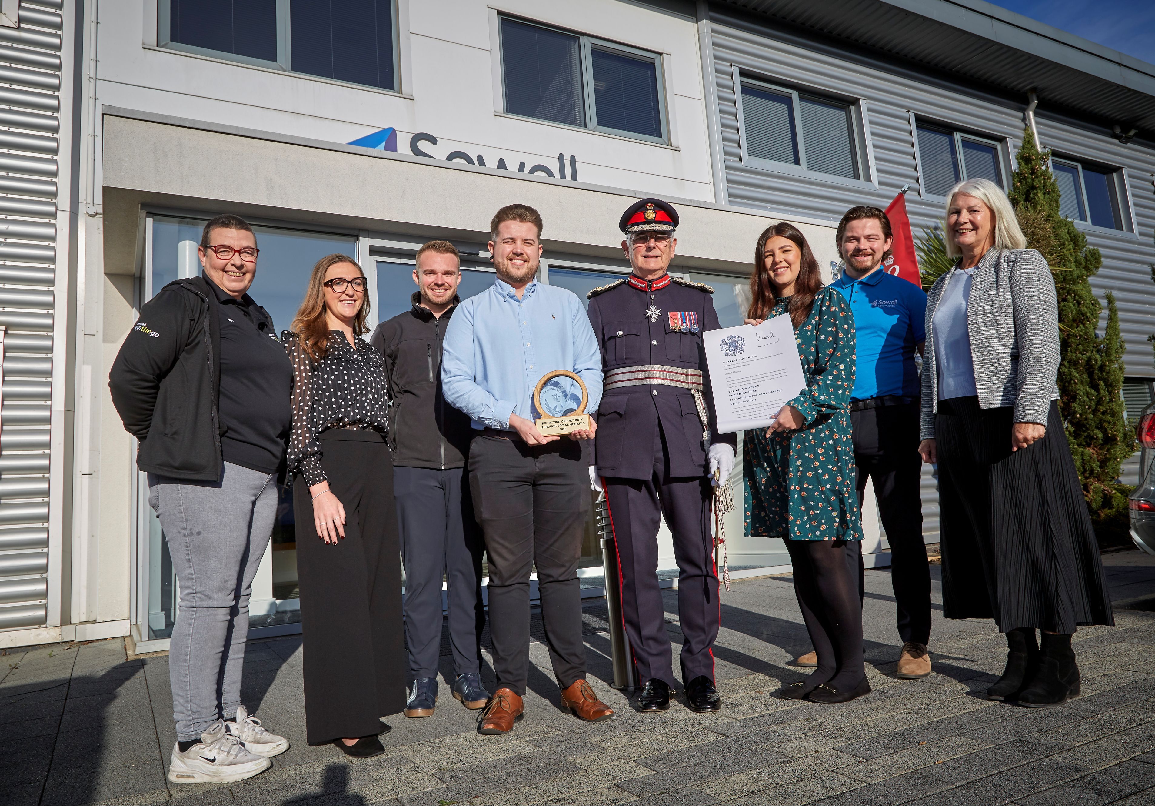 Sewell Group staff are presented with their Kings Award by the Lord Lieutenant