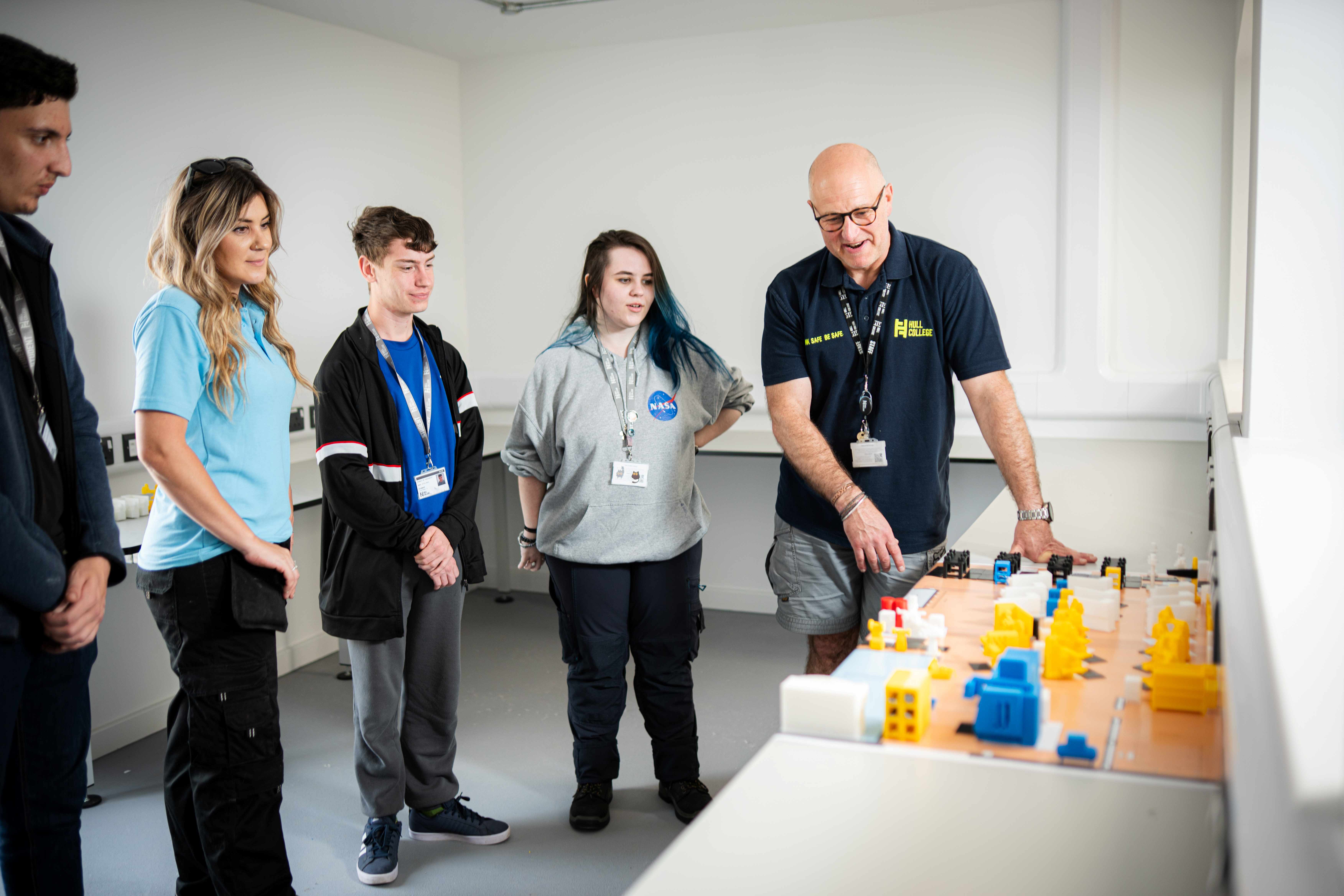 Students being shown a 3 D model of Greenwave