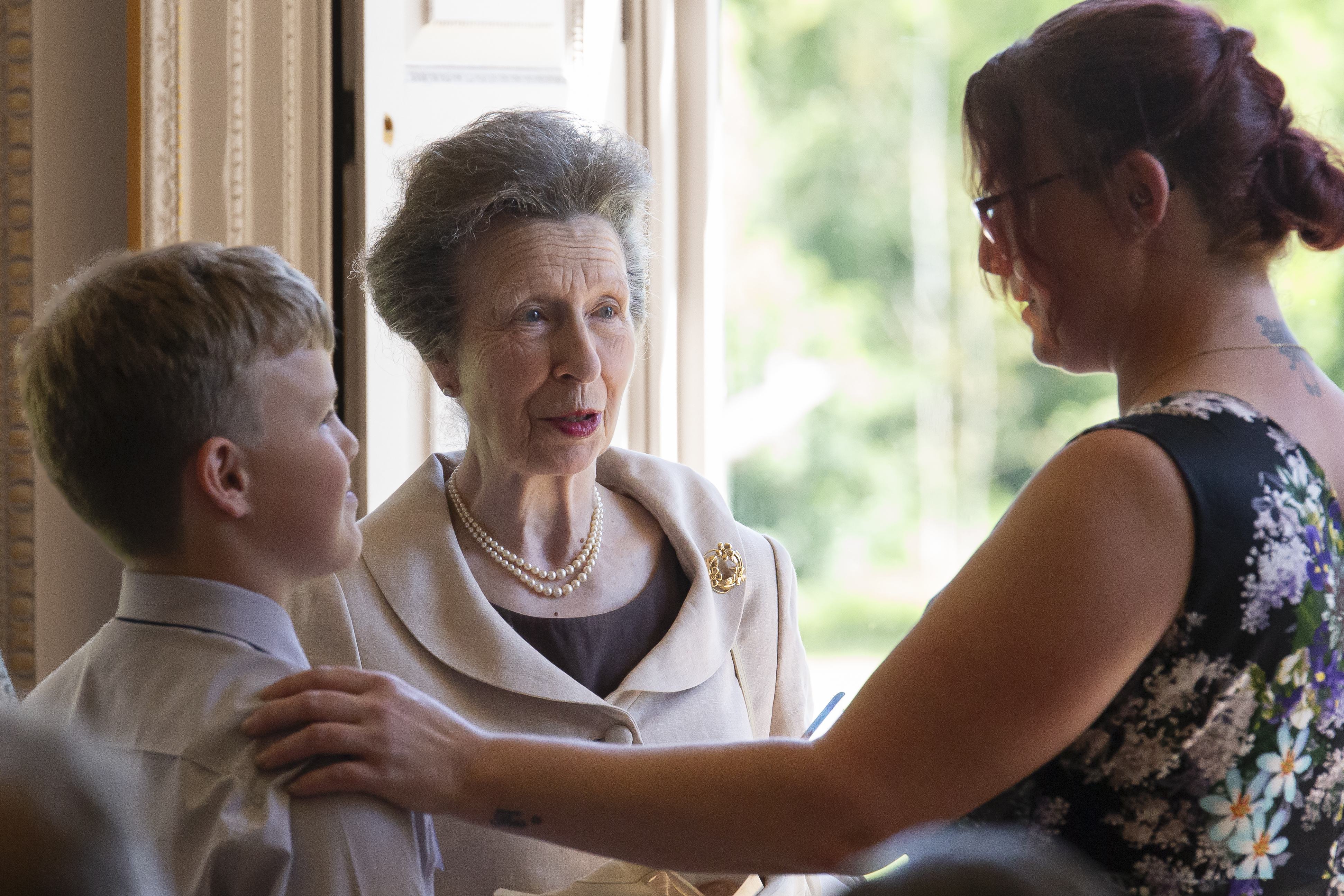Theo HRH and Kat receiving a Family Award