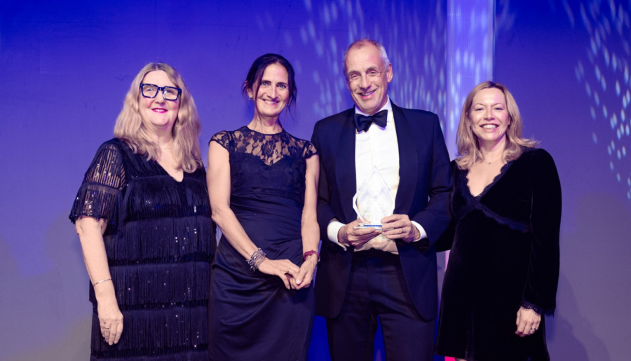 Members of the Quickline team picking up the Digital Inclusion Champion award