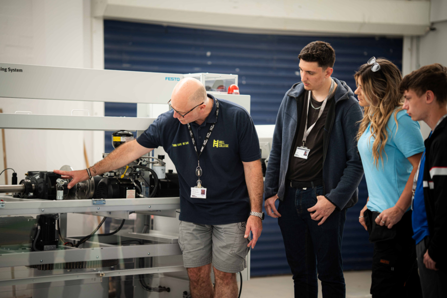 Nick Marshall Head of Engineering and Advanced Motor Vehicle at Hull College showing students some of the specialist equipment in Greenwave